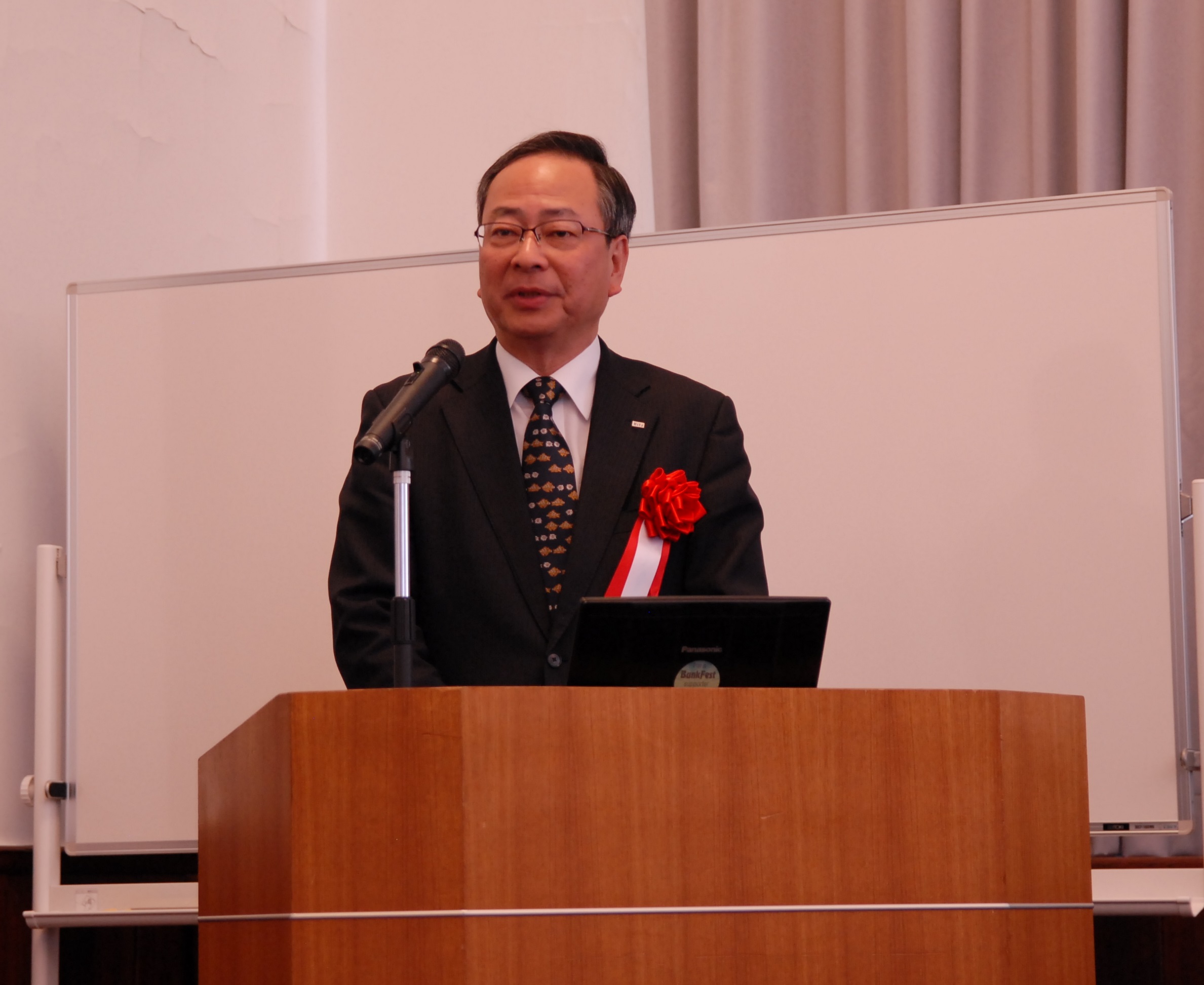 Mr. Sadao Mino, President of the Council for Cooperative Center